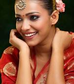 Gold plated kundan green stone maang tikka