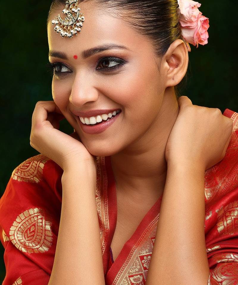 Gold plated kundan green stone maang tikka