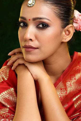 Gold plated kundan green stone maang tikka