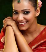 Gold plated kundan green stone maang tikka