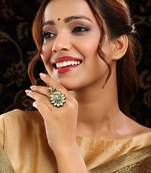 Gold plated kundan green stone ring