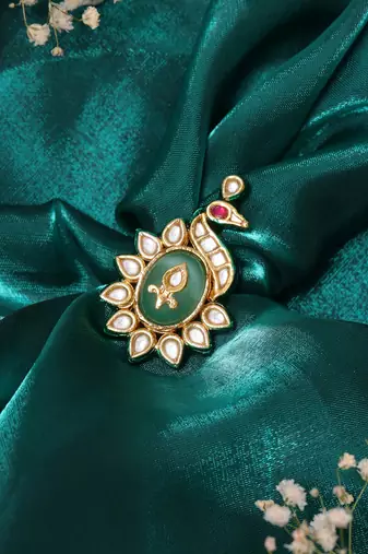 Gold plated kundan green stone ring