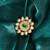 Gold plated kundan green stone ring