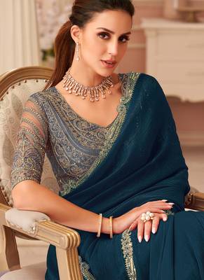 Peacock  blue georgette sequince & cut work border heavy designer blouse party wear saree 2
