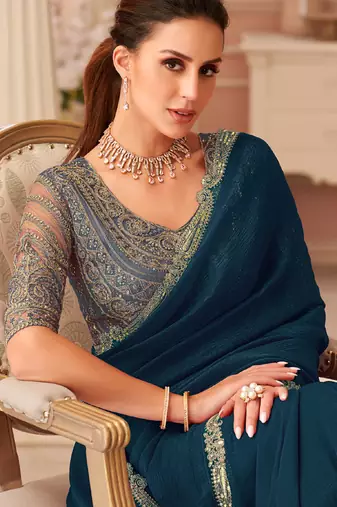 Peacock  blue georgette sequince & cut work border heavy designer blouse party wear saree