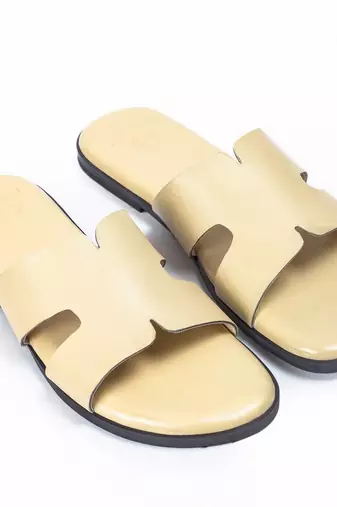 Beige solid leather flats