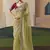 Olive tissue silk sequince & resham work cut work border heavy designer saree