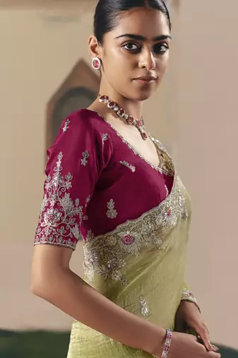 Olive tissue silk sequince & resham work cut work border heavy designer saree