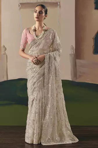 Beige tissue silk sequince & resham work cut work border heavy designer saree