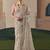 Beige tissue silk sequince & resham work cut work border heavy designer saree
