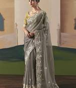 Gary tissue silk sequince & resham work  cut work border heavy designer saree
