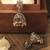 Round and pear shape silver plated pearl brown kundan stone jhumki earring for women and girls