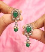 Ethnic oval and leaf design gold plated green kundan stone dangle earring for women and girls