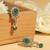 Ethnic oval and leaf design gold plated green kundan stone dangle earring for women and girls