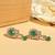 Ethnic oval and leaf design gold plated green kundan stone dangle earring for women and girls