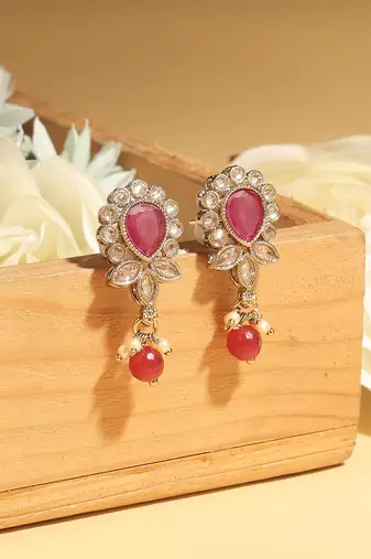 maroon alloy dangle earrings with ruby kundan oval leaf
