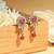 Excellent oval and leaf design gold plated ruby kundan stone dangle earring for women and girls