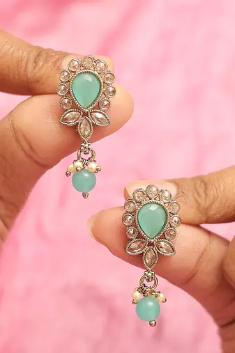 Oval and leaf design gold plated sky blue kundan stone dangle earring for women and girls