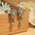 Oval and leaf design gold plated sky blue kundan stone dangle earring for women and girls