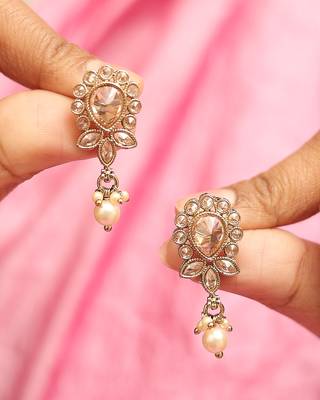 Exotic oval and leaf design gold plated brown kundan stone dangle earring for women and girls 1