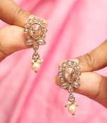 Exotic oval and leaf design gold plated brown kundan stone dangle earring for women and girls