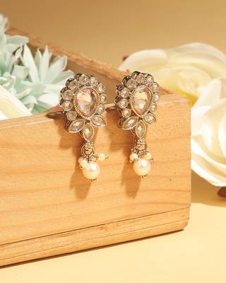 Exotic oval and leaf design gold plated brown kundan stone dangle earring for women and girls 2