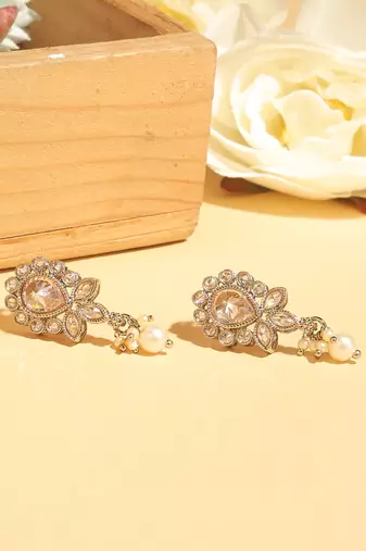 Exotic oval and leaf design gold plated brown kundan stone dangle earring for women and girls