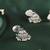 Leaf and pear shape silver plated light green kundan stone brass jhumki earring for women and girls