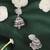 Modish leaf and pear shape silver plated pink kundan stone brass jhumki earring for women and girls