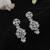 Lavish round shape silver plated white pearl kundan stone dangle earring for women and girls