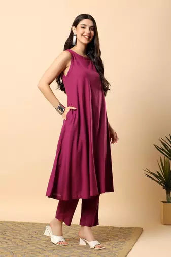 Women purple cotton flex solid & hand embroidery work kurta with trousers set