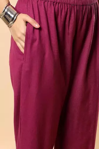 Women purple cotton flex solid & hand embroidery work kurta with trousers set