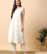 Women off white cotton flex solid & hand embroidery work kurta with trousers set