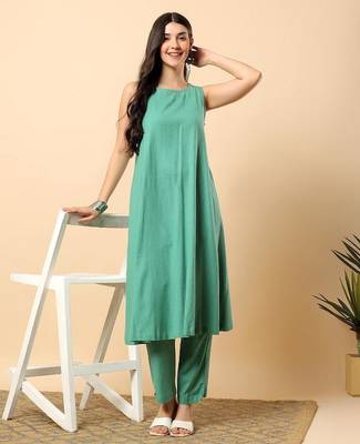 Women sea green cotton flex solid & hand embroidery work kurta with trousers set 1