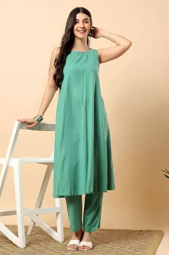 Women sea green cotton flex solid & hand embroidery work kurta with trousers set