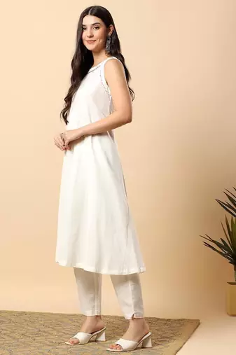 Women off white cotton flex solid & hand embroidery work kurta with trousers set
