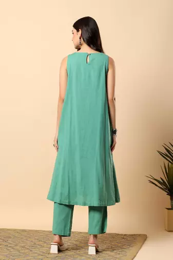 Women sea green cotton flex solid & hand embroidery work kurta with trousers set