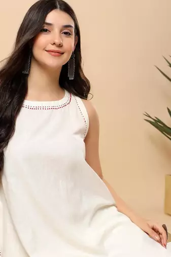 Women off white cotton flex solid & hand embroidery work kurta with trousers set