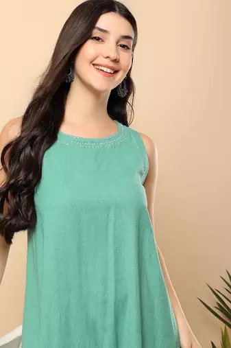 Women sea green cotton flex solid & hand embroidery work kurta with trousers set