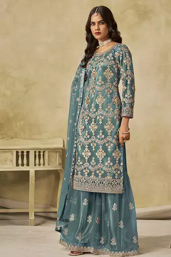 Turquoise embroidered sequins work net palazzo kameez