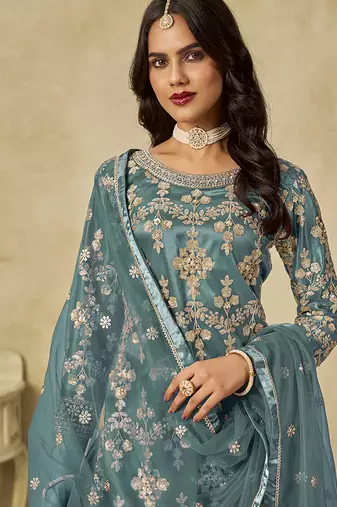 Turquoise embroidered sequins work net palazzo kameez