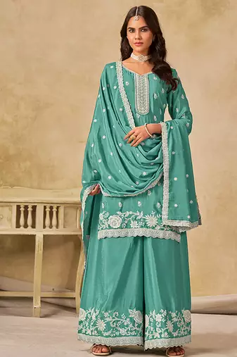 Embroidered turquoise chinon silk palazzo salwar suit