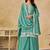 Embroidered turquoise chinon silk palazzo salwar suit