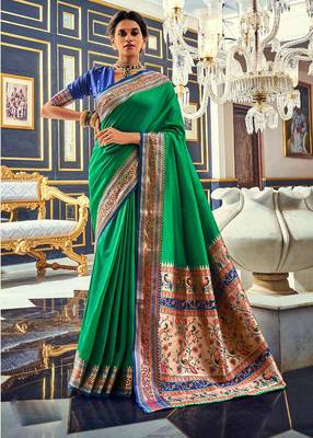 Women's dark green soft silk blend woven saree with unstitched silk blend blouse piece 1