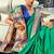 Women's dark green soft silk woven saree with unstitched silk blouse piece