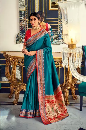 Women's teal soft silk woven saree with unstitched silk blouse piece