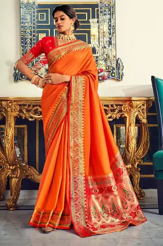 Women's orange soft silk woven saree with unstitched silk blouse piece