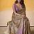 Women's brown tissue silk solid  saree with unstitched silk blouse piece
