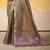 Women's brown tissue silk solid  saree with unstitched silk blouse piece