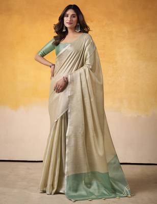 Women's beige tissue silk blend solid saree with unstitched silk blend blouse piece 1